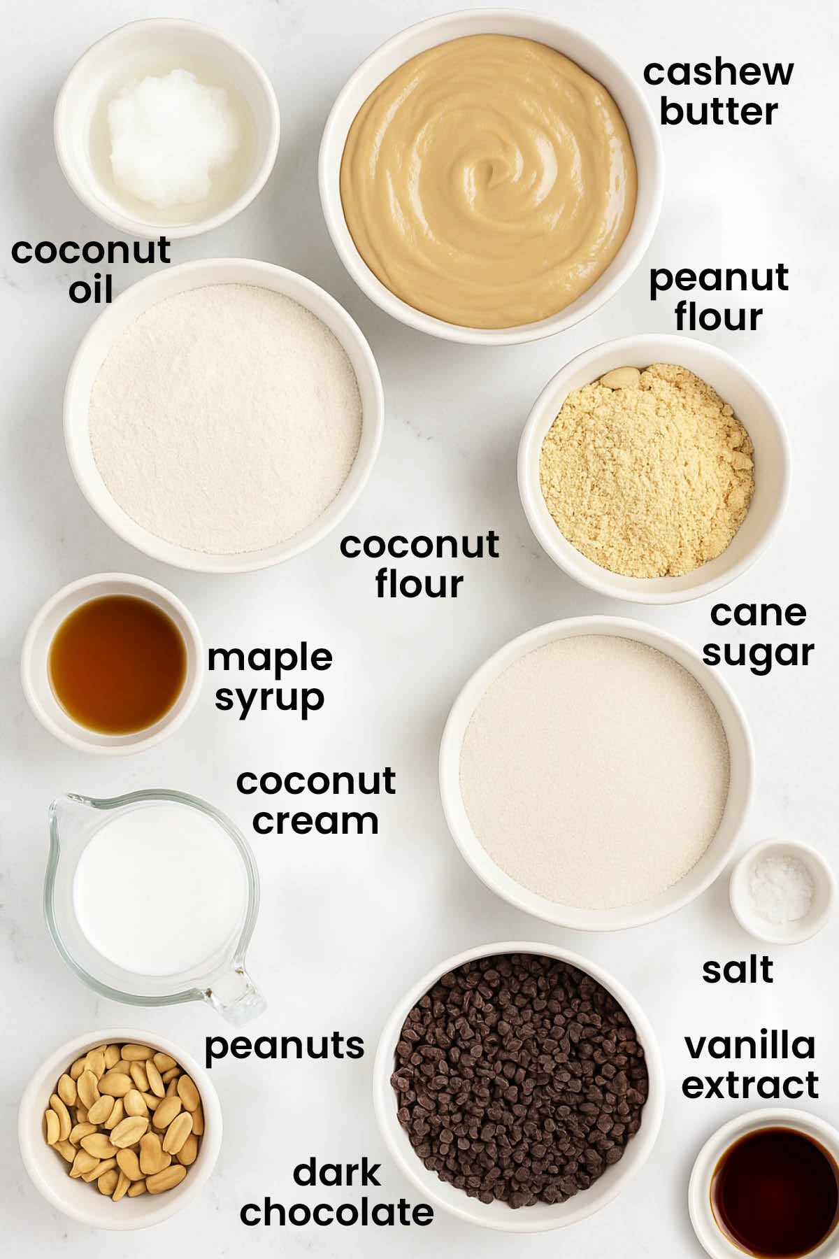 individual ingredients for vegan snickers bars laid out against a white background.