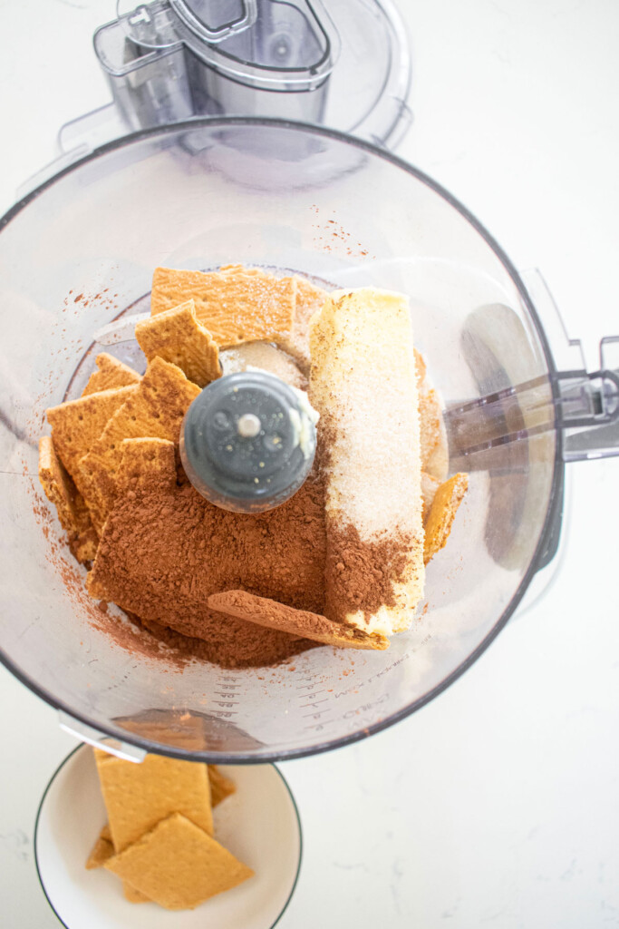 graham crackers, butter, cane sugar and dutch cocoa powder in a food processor.