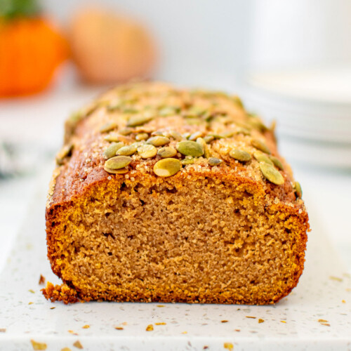 cut cinnamon sweet potato bread without eggs on a a white marble board.