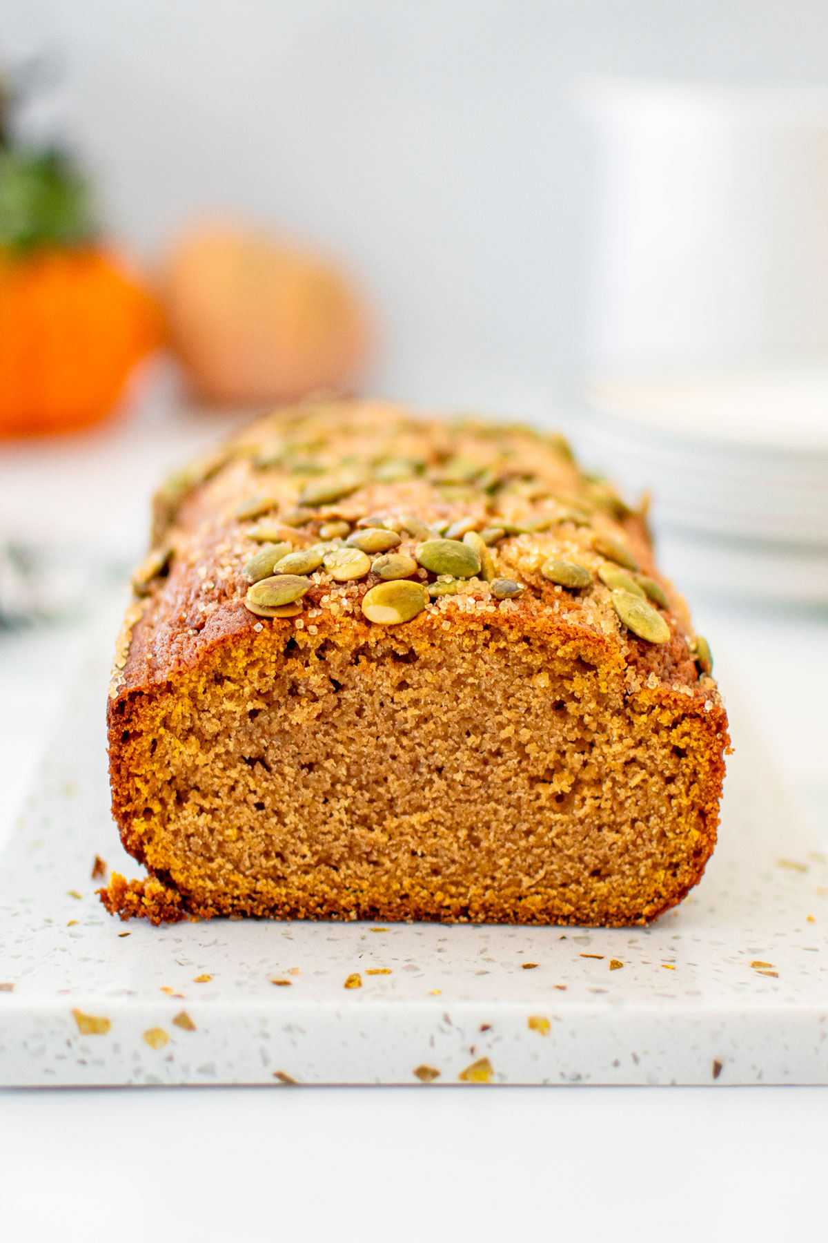 cut cinnamon sweet potato bread without eggs on a a white marble board.