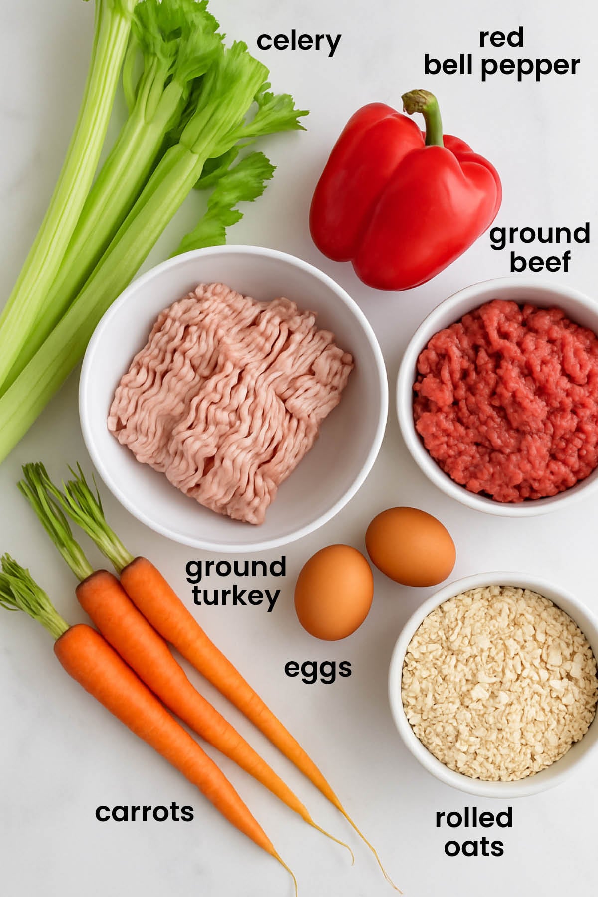 individual ingredients for turkey meatloaf for dogs laid out against a white background.