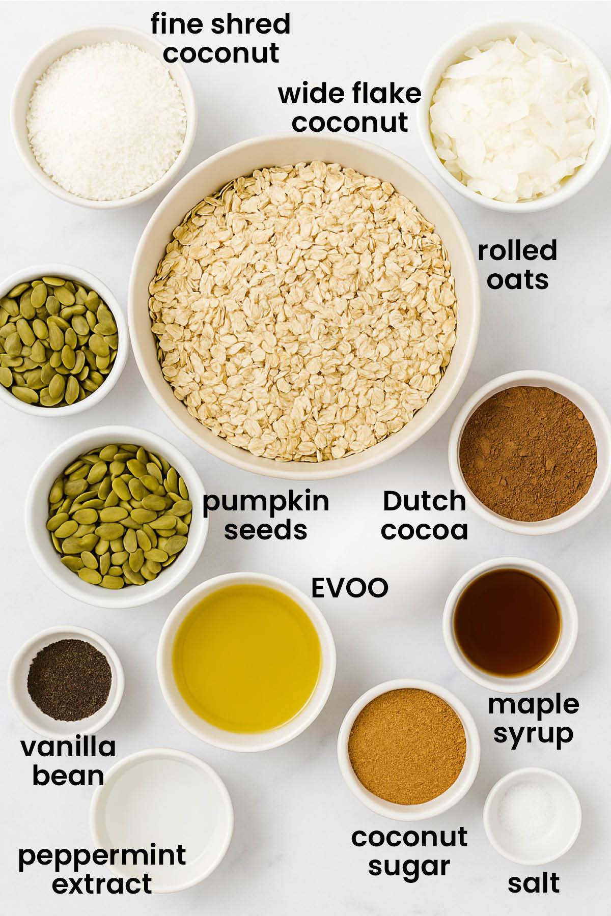 individual ingredients for chocolate peppermint olive oil granola laid out against a white background.