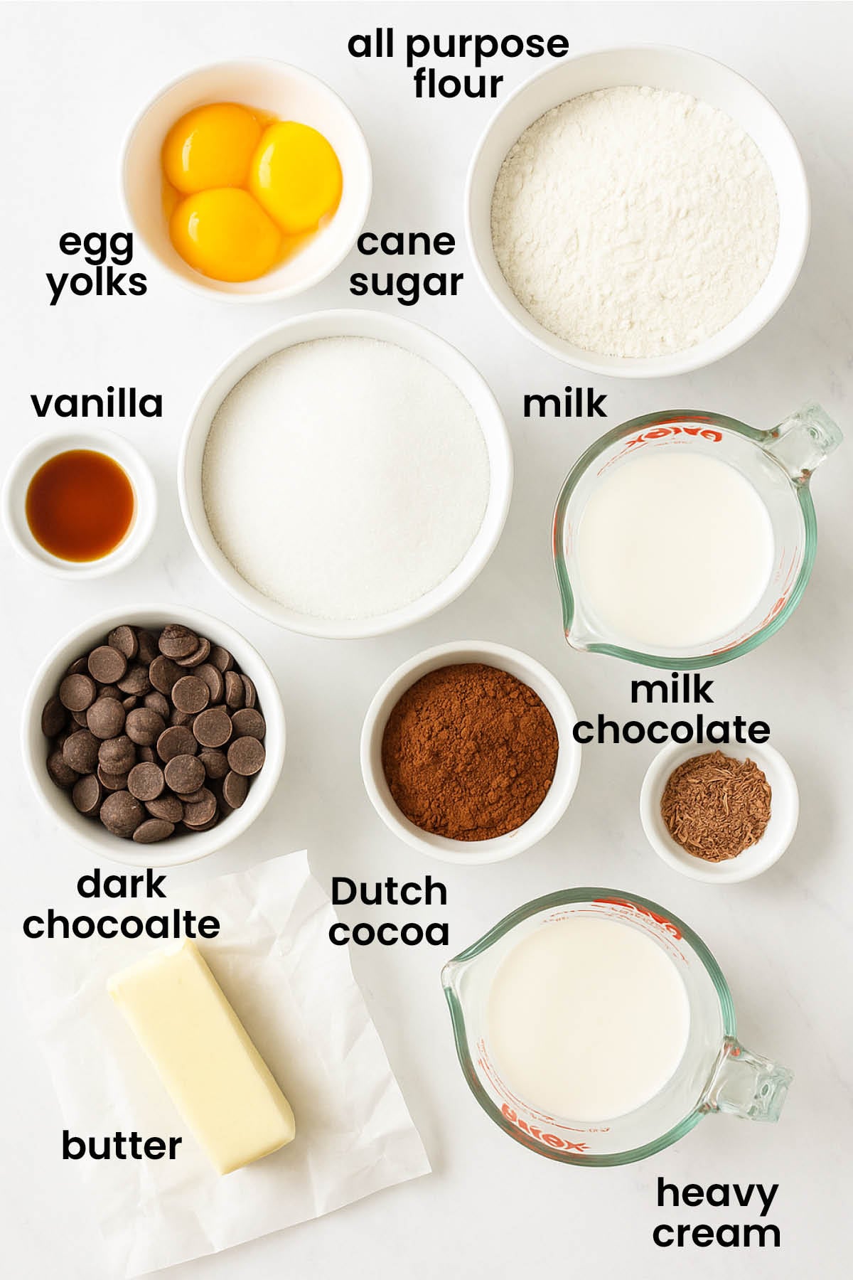 individual ingredients for dark chocolate sweet cream pie laid out against a white background.