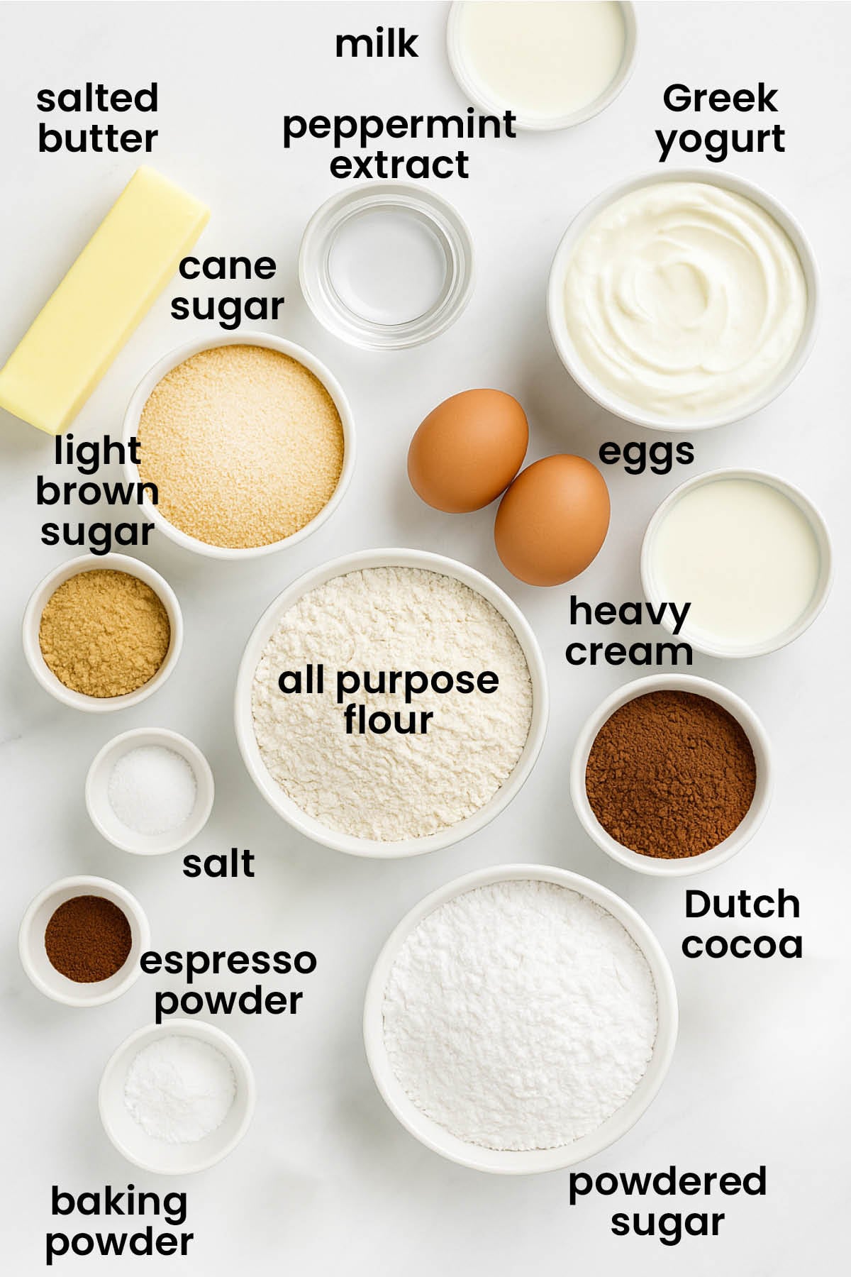 individual ingredients for peppermint mocha coffee cake laid out against a white background.