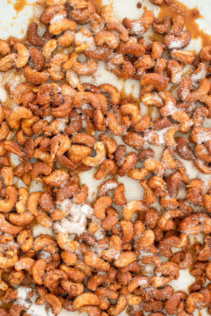 honey roasted cashews on a baking sheet.
