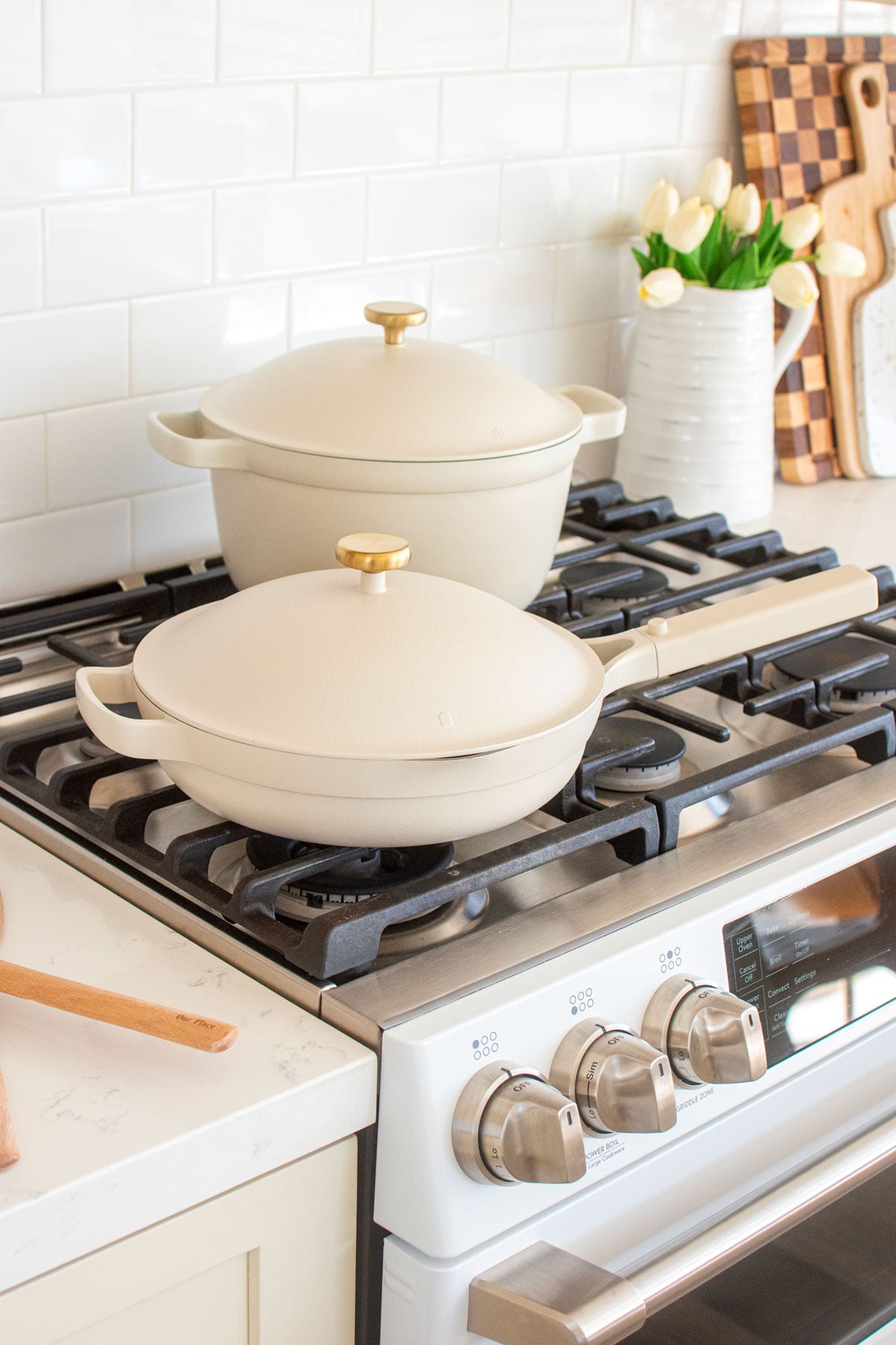 our place duo pan set on a a white oven in the kitchen.