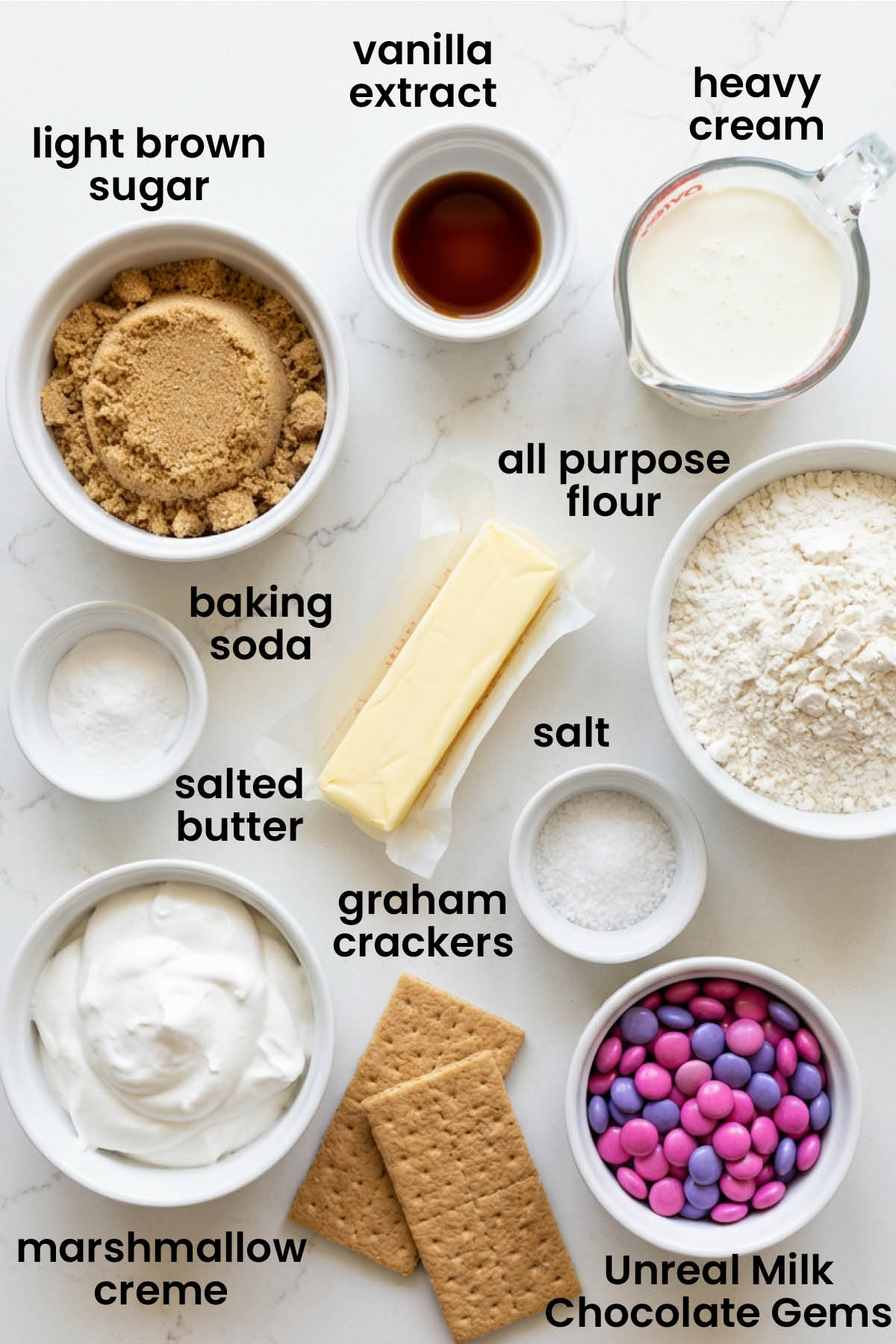 individual ingredients for valentine's day s'more bars laid out against a white background.