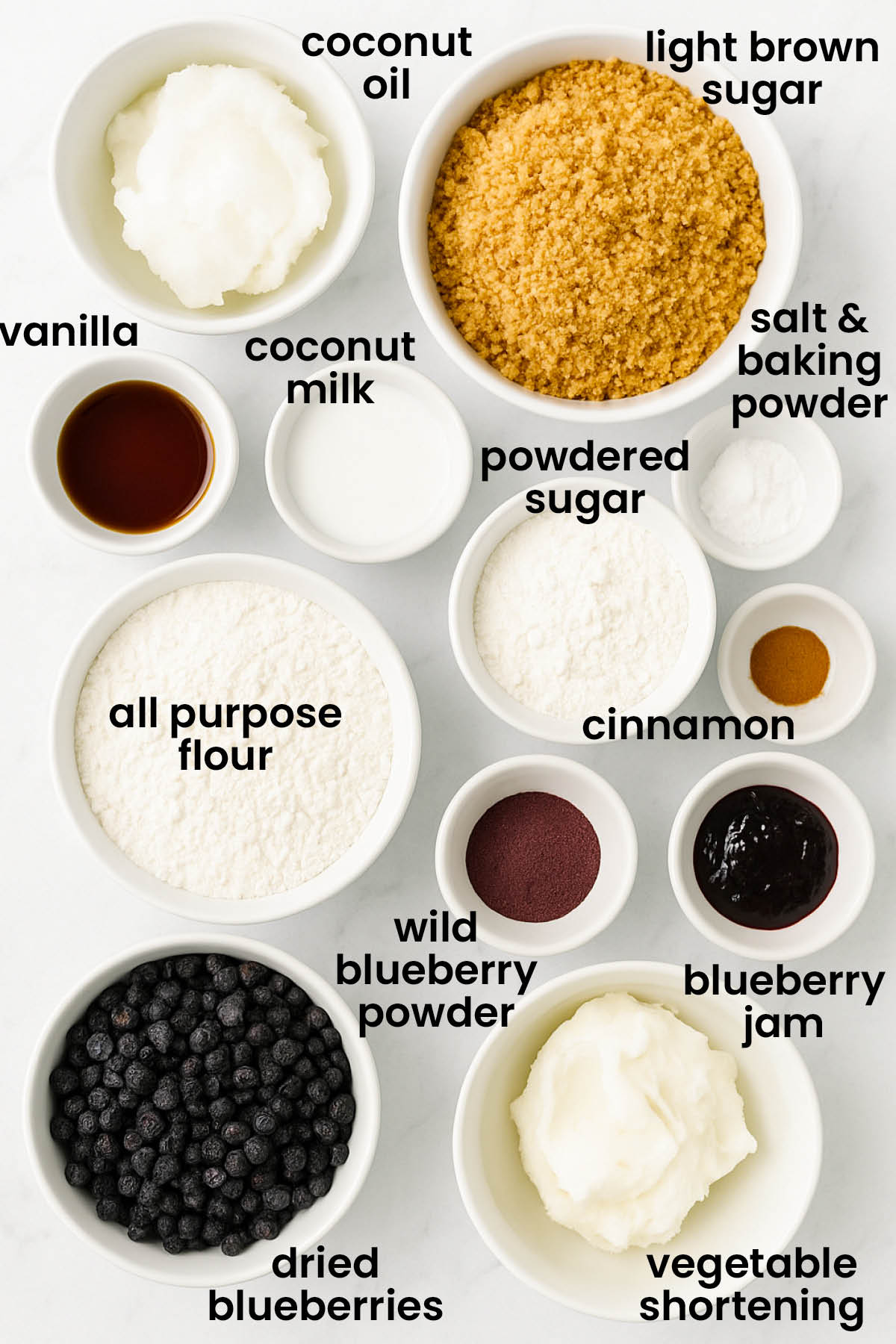 individual ingredients for vegan blueberry blondies laid out against a white background.