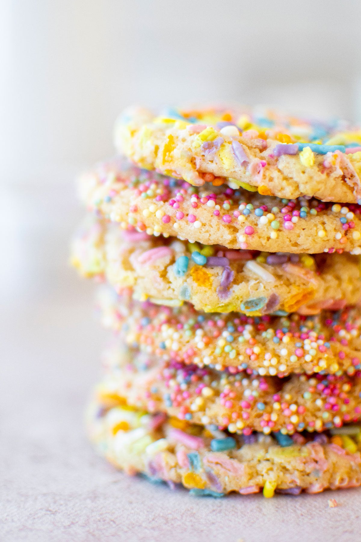 stack of eggless sprinkle cookies.
