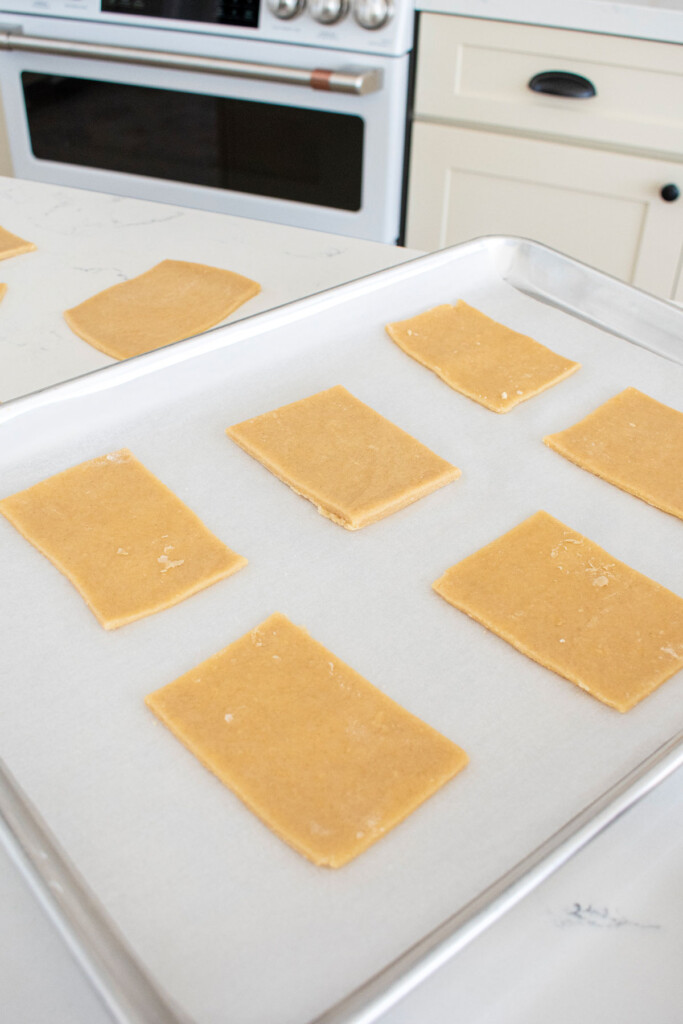 sourdough pop tart dough squares on a baking sheet.