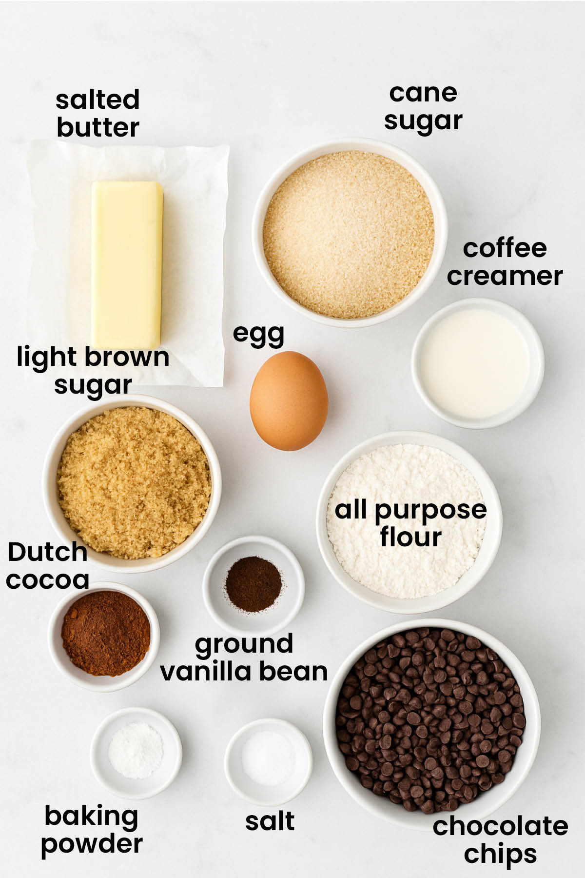 individual ingredients for chewy chocolate espresso cookies laid out against a white background.