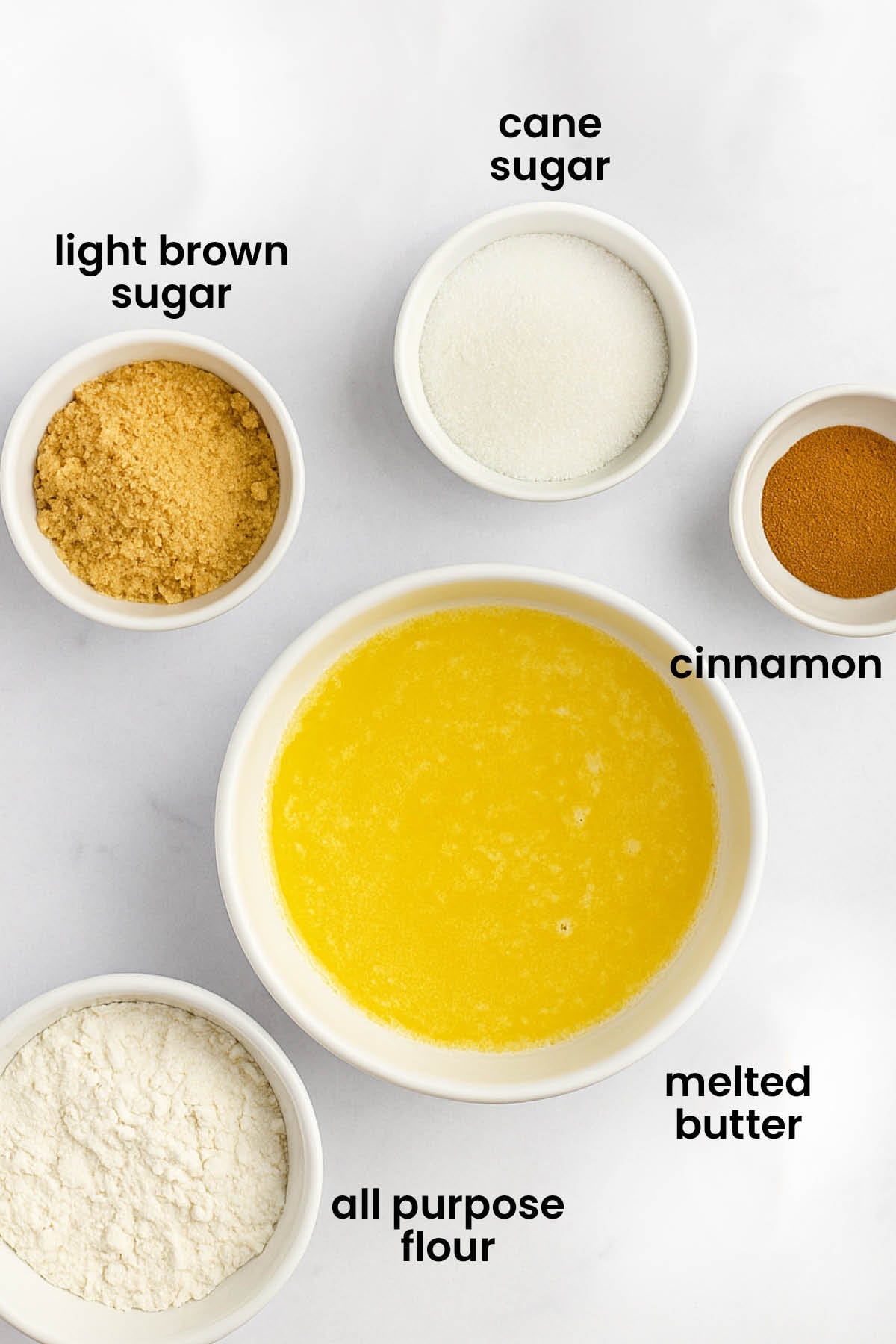 individual ingredients for streusel topping laid out against a white background.