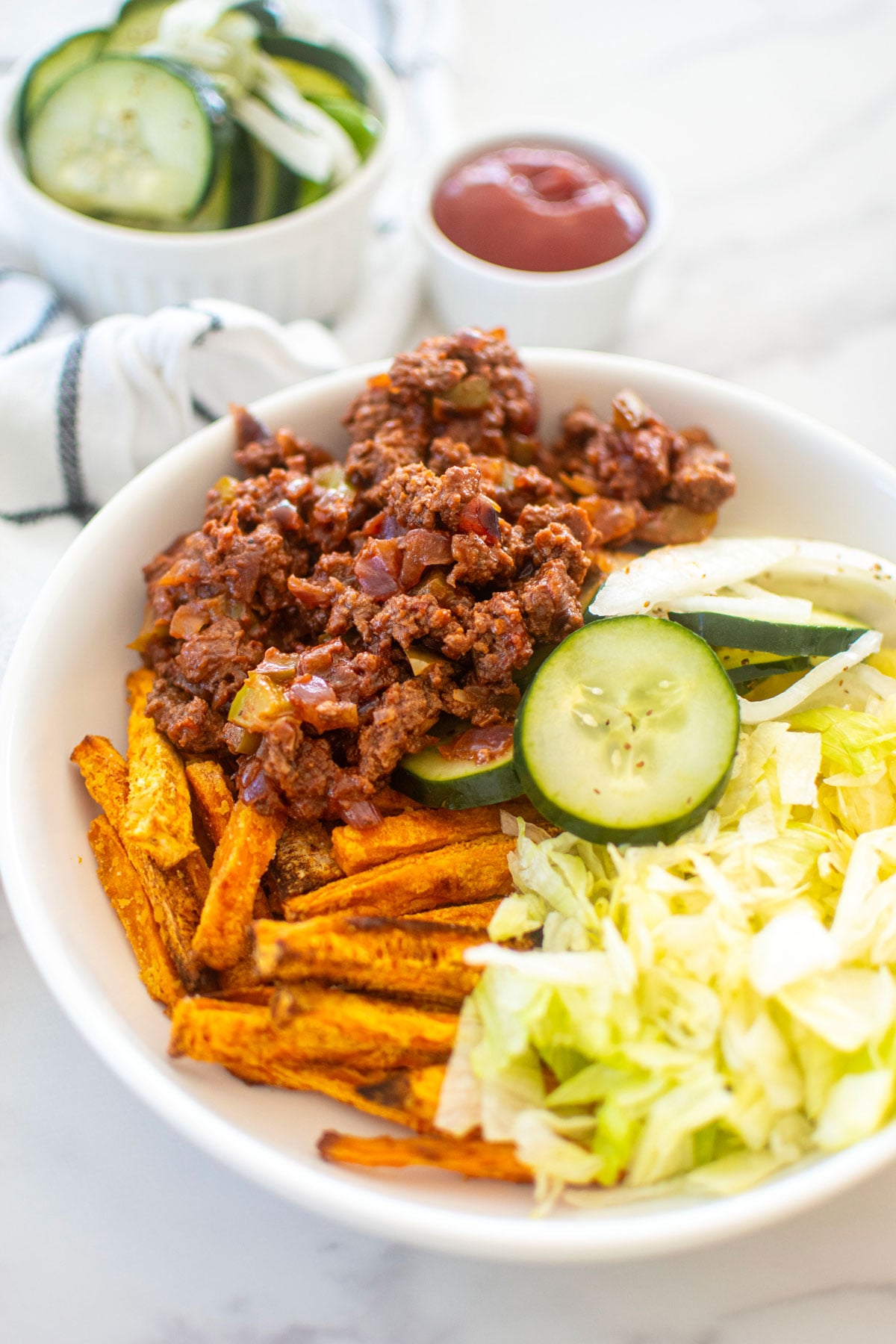 healthy sloppy joe bowl on a white marble countertop.