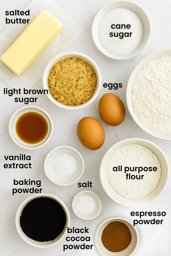 individual ingredients for organic halloween cookies laid out against a white background.