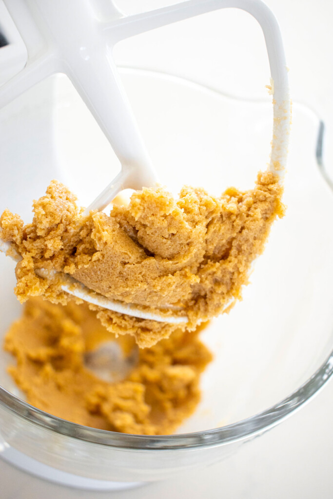creamed butter and sugar in a glass mixing bowl.