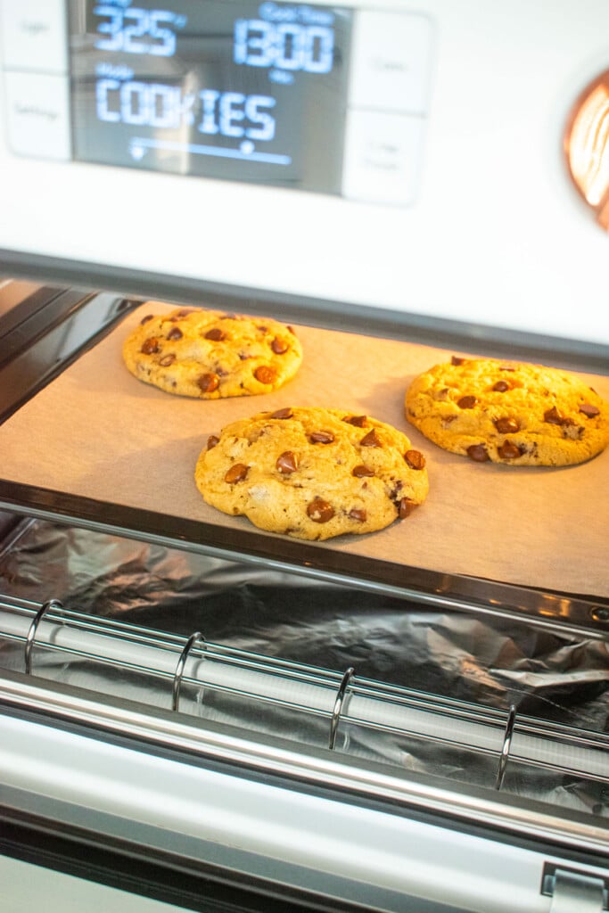 maple brown sugar cookies baking in a countertop oven.