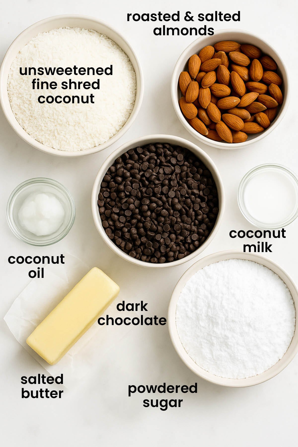 individual ingredients for healthy almond joy bars laid out against a white background.