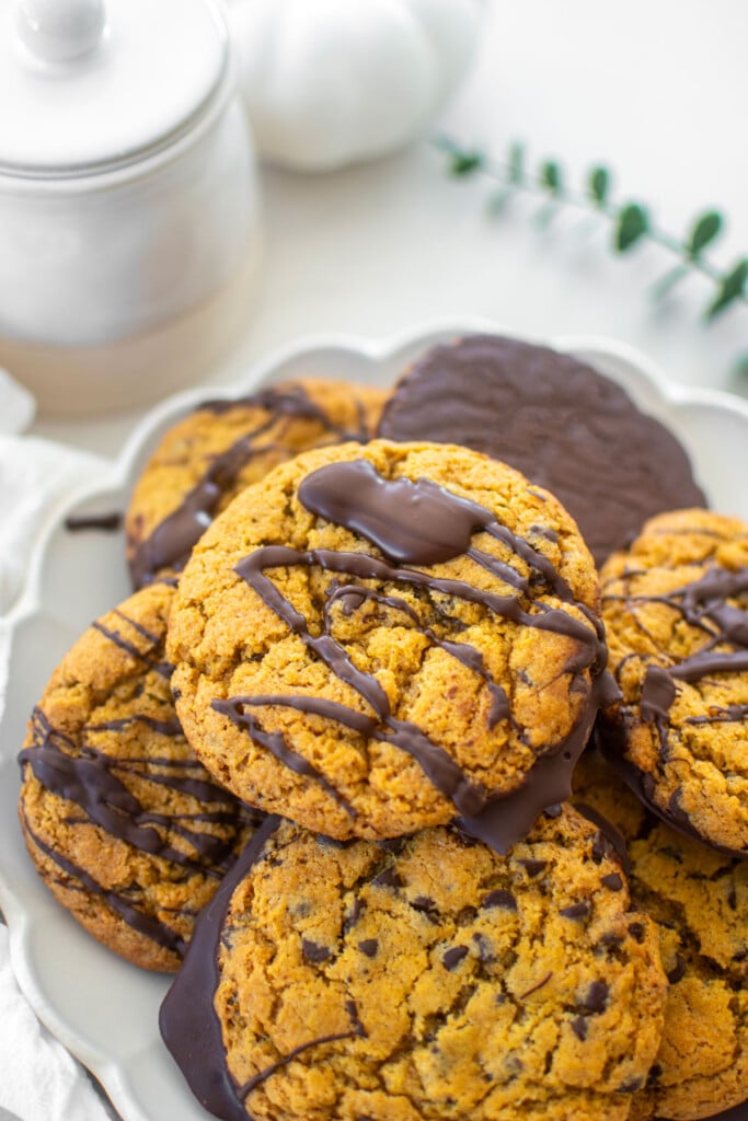 pumpkin chocolate chip cookies without eggs on a plate.