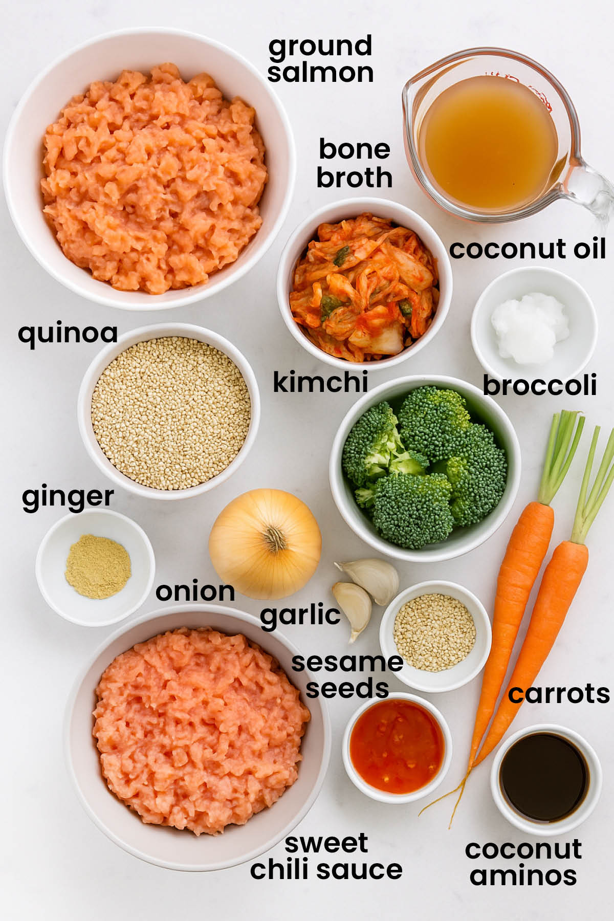 individual ingredients for sesame ginger salmon bowl with quinoa laid out against a white background.
