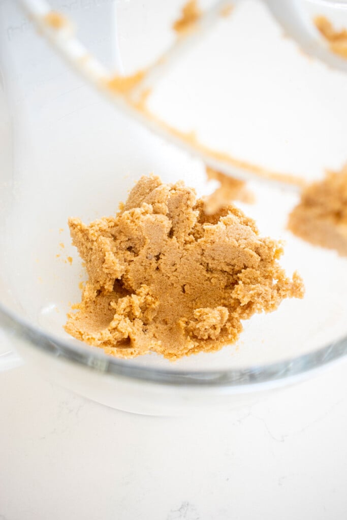 vegan shortening and sugar creamed together in a glass mixing bowl.