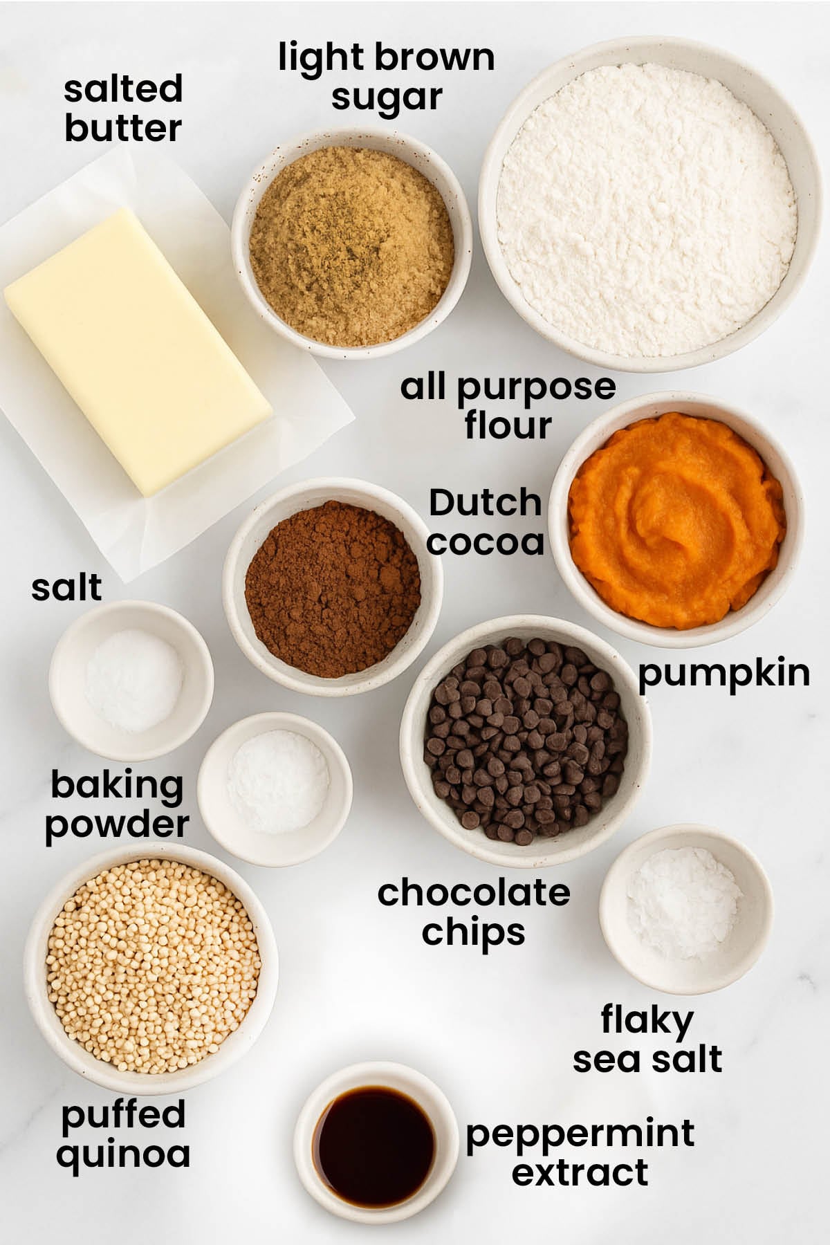 individual ingredients for chocolate peppermint crunch cookies laid out against a white background.