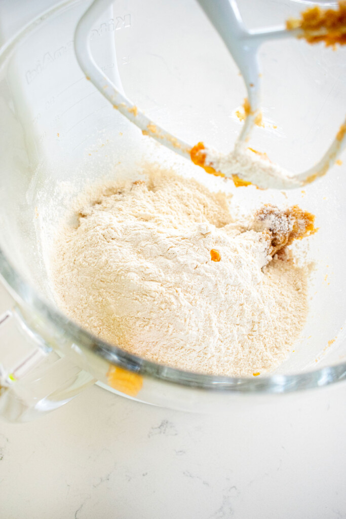 ingredients for eggless brown sugar pumpkin snickerdoodles in a glass mixing bowl.