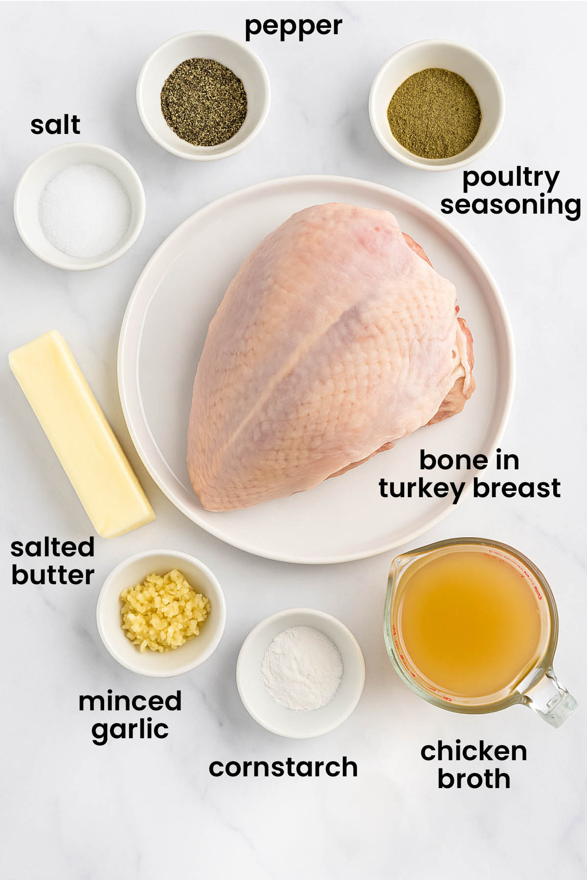 individual ingredients for slow cooker turkey laid out against a white background.