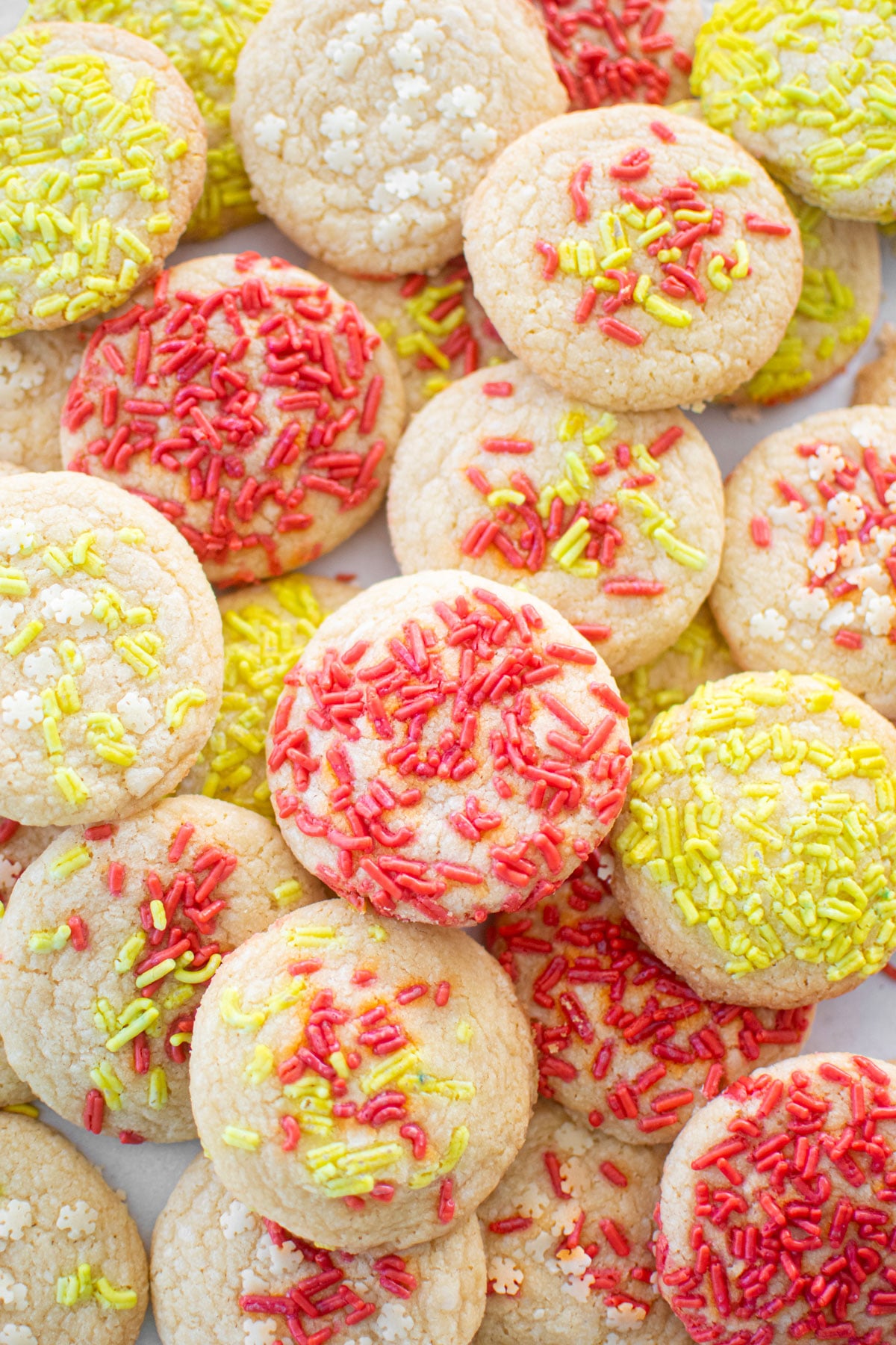simple christmas shortbread cookies on a baking sheet.
