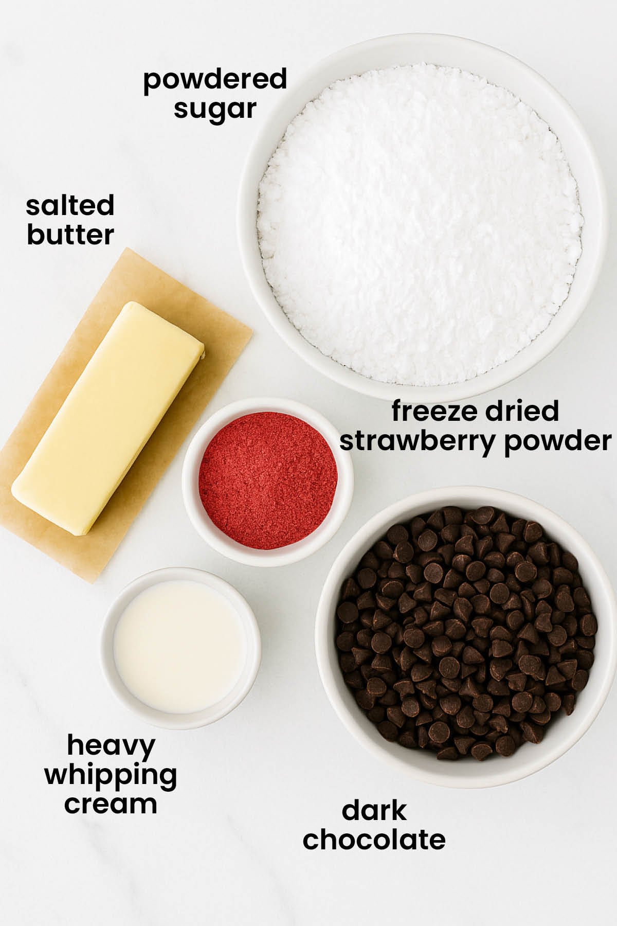 individual ingredients for strawberry cream drops laid out against a white background.