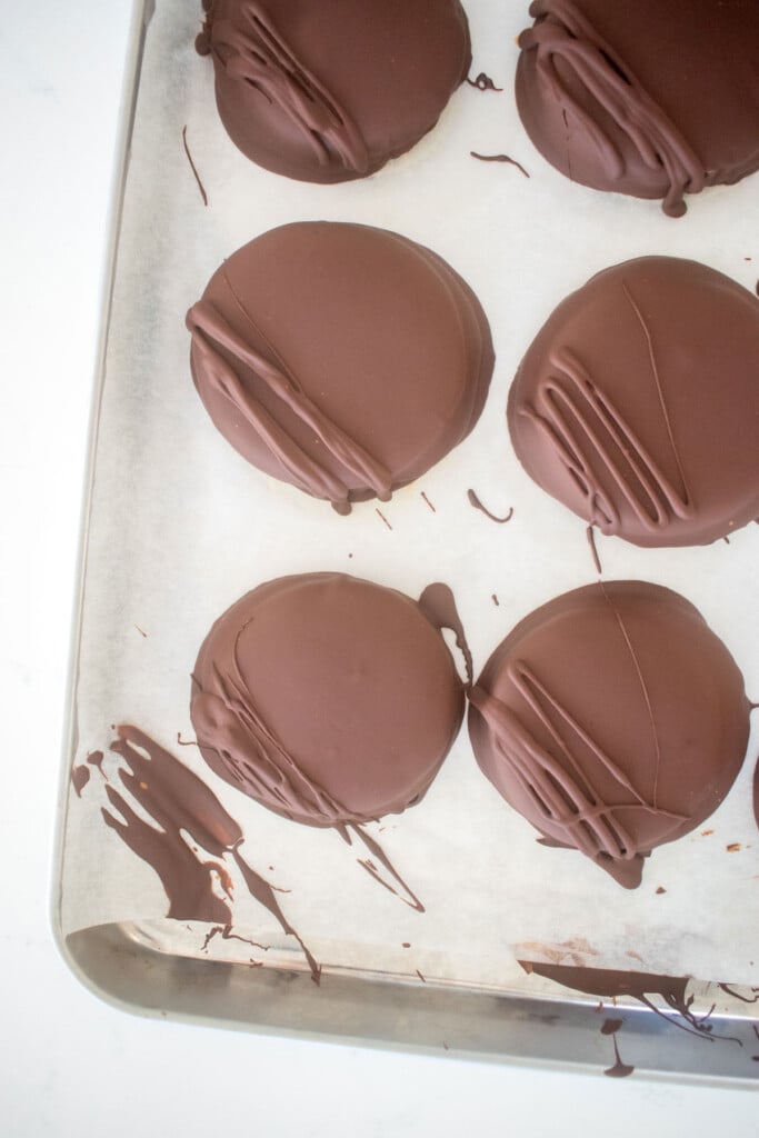 homemade tagalong cookies on a baking sheet.