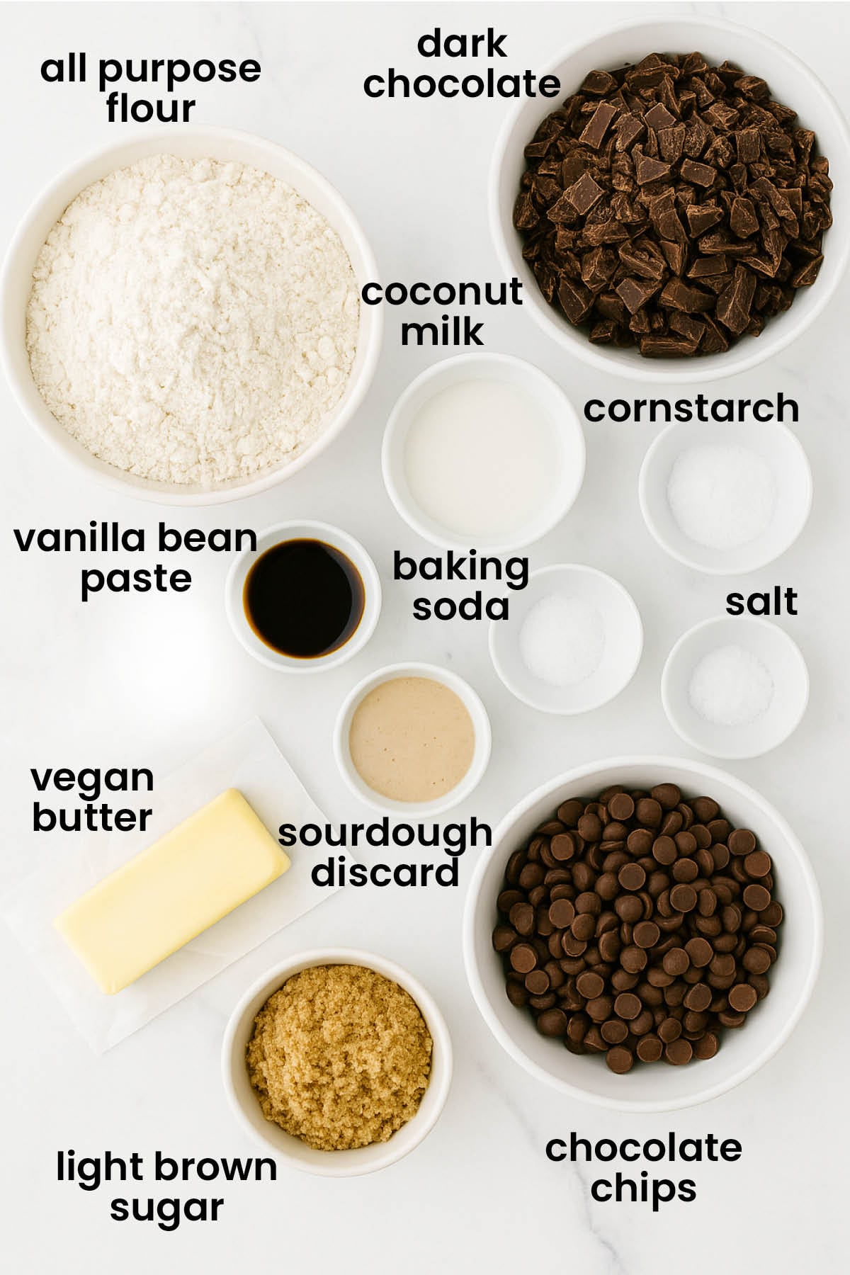 individual ingredients for vegan sourdough chocolate chip cookies laid out against a white background.