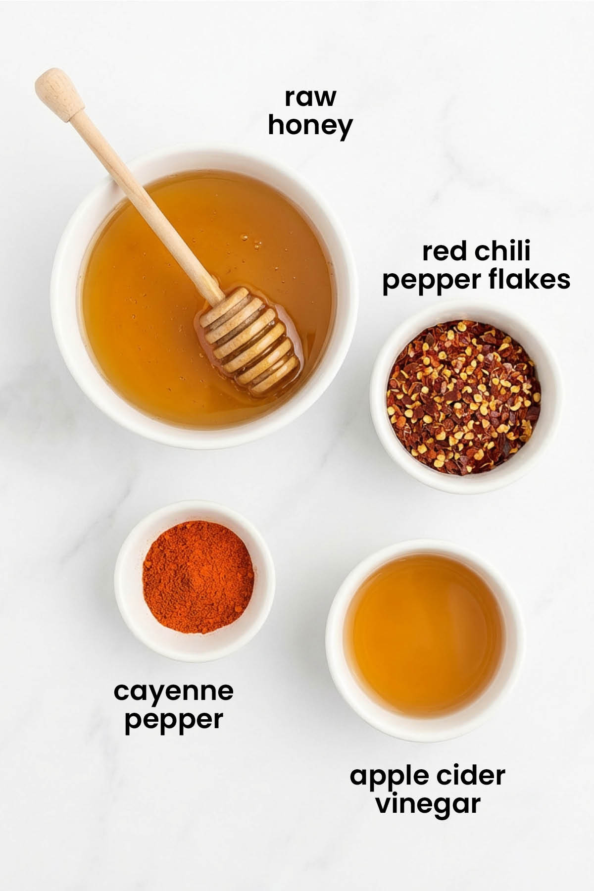 individual ingredients for homemade organic hot honey laid out against a white background.