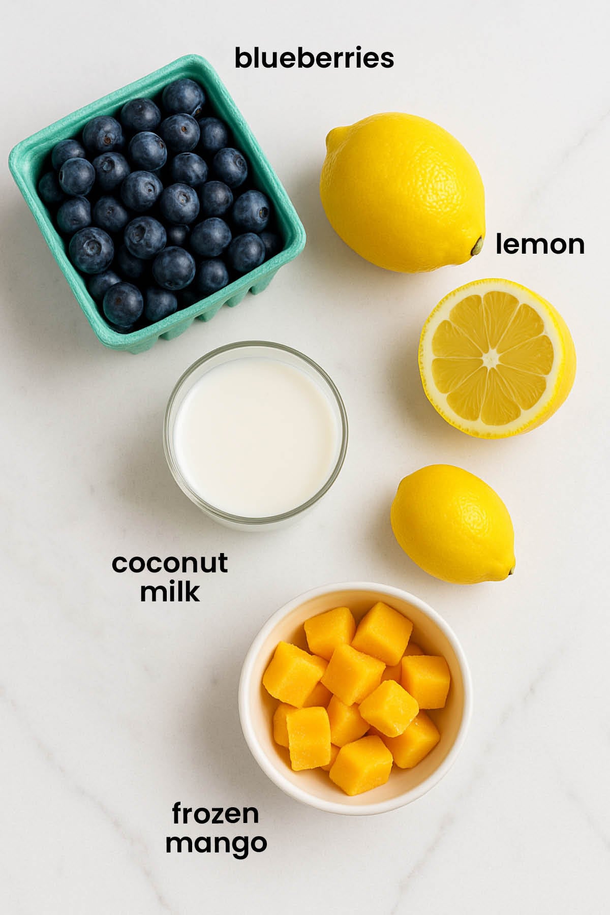 individual ingredients for lemon blueberry smoothie laid out against a white background.