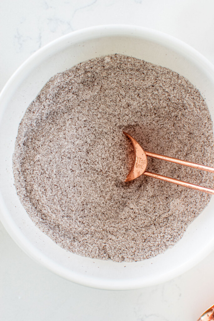 vanilla sea salt in a bowl being mixed together.