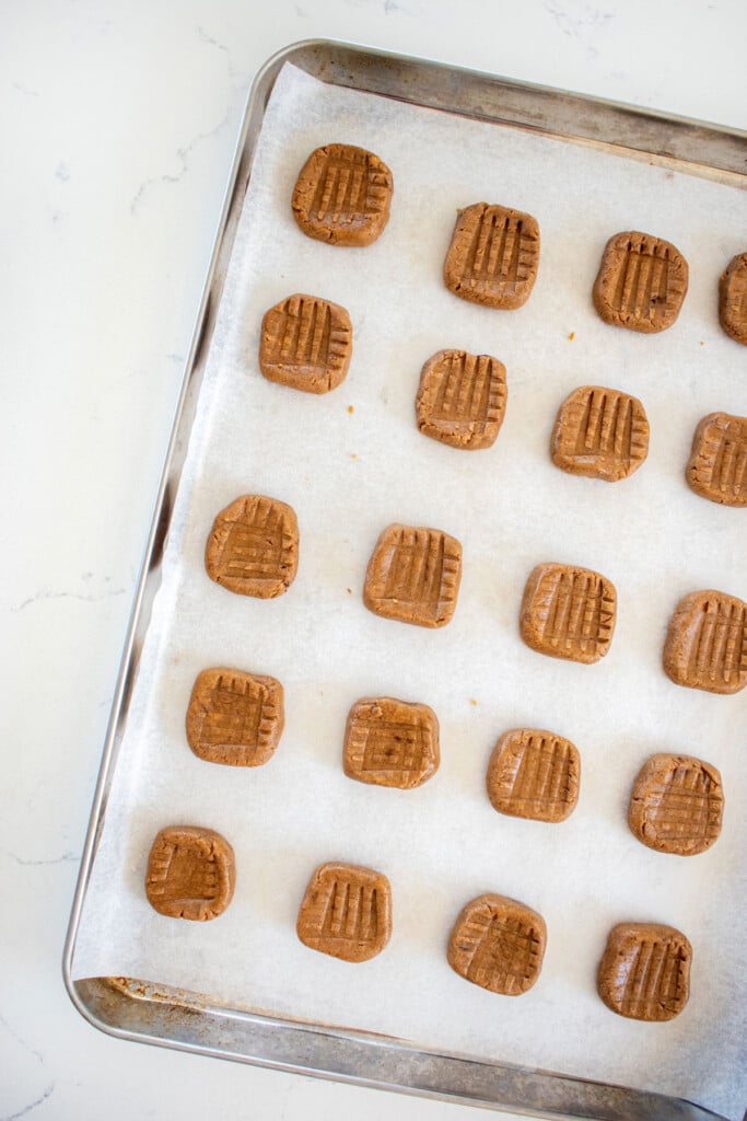 mushroom peanut butter dog treat dough on a baking sheet.