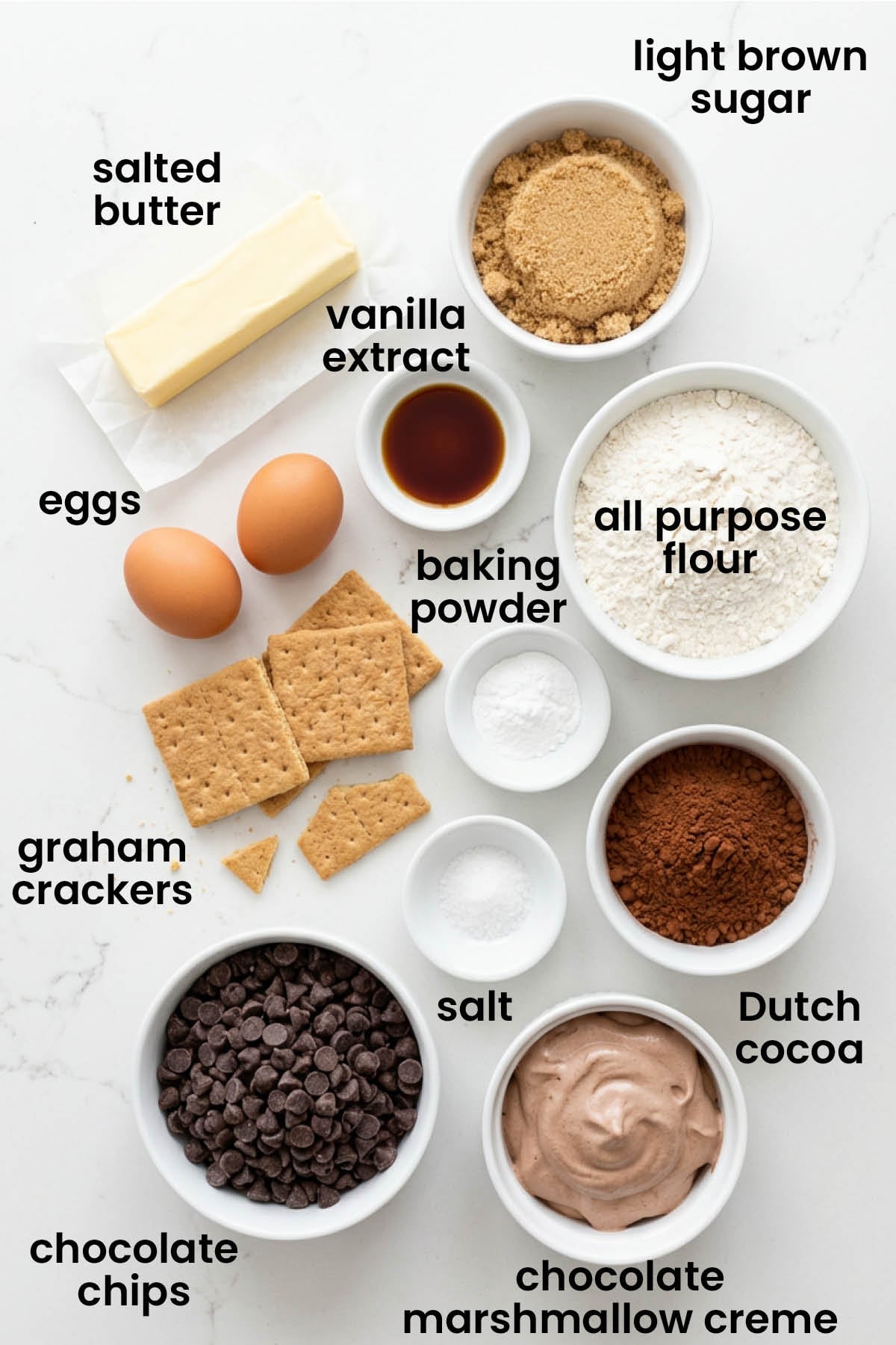 individual ingredients for chocolate smore cookies laid out against a white background.