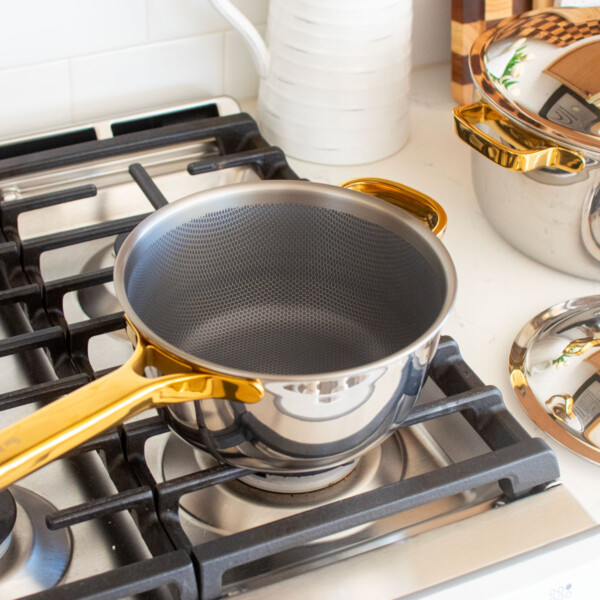 our place titanium pan on a stovetop.