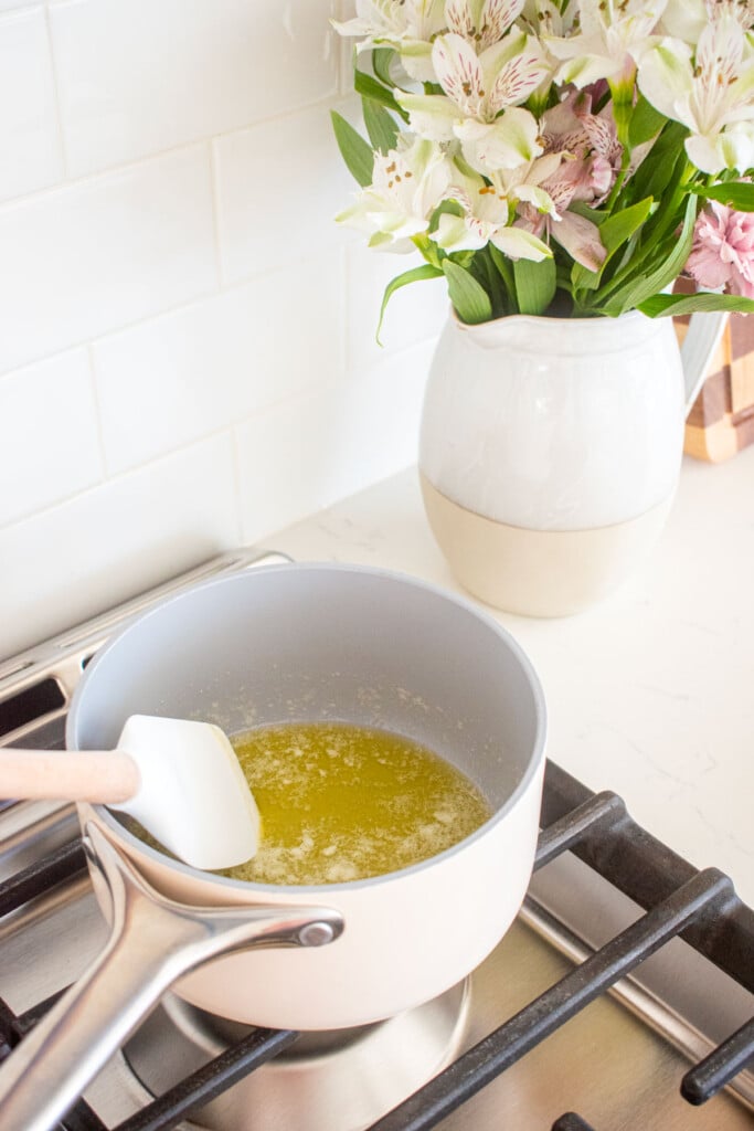 melted butter in a small saucepan on the stovetop.