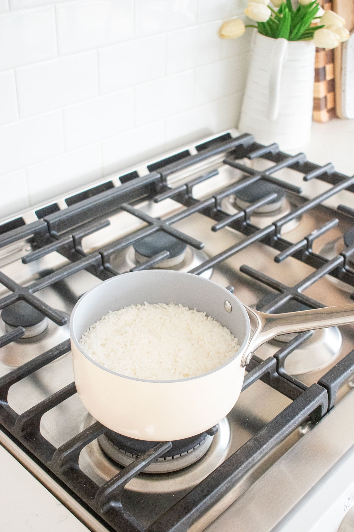cooked rice in a small pot on the stovetop.