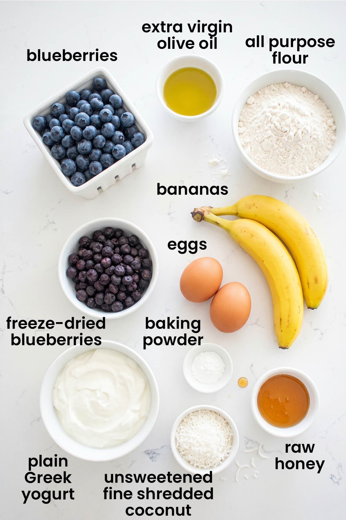 individual ingredients for dog birthday cake without peanut butter laid out against a white background.