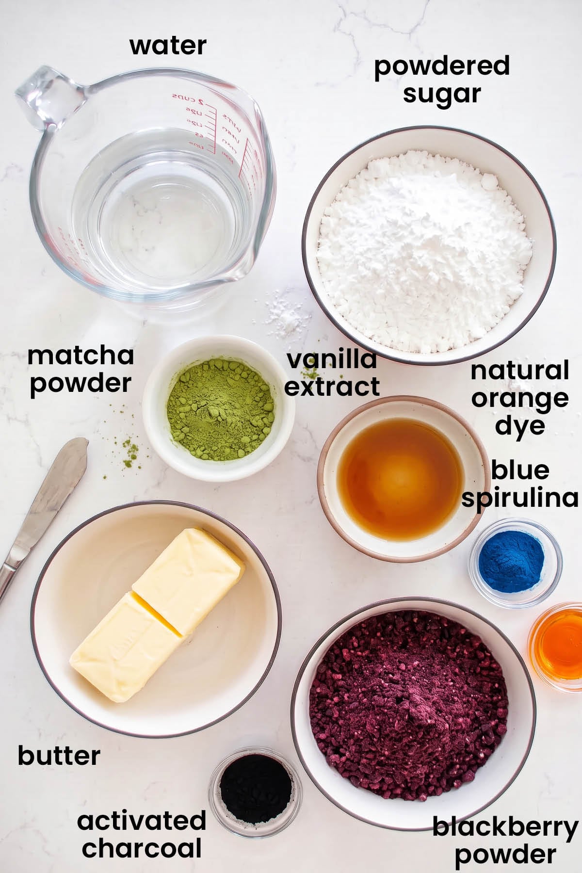 individual ingredients for monster cake laid out against a white background.